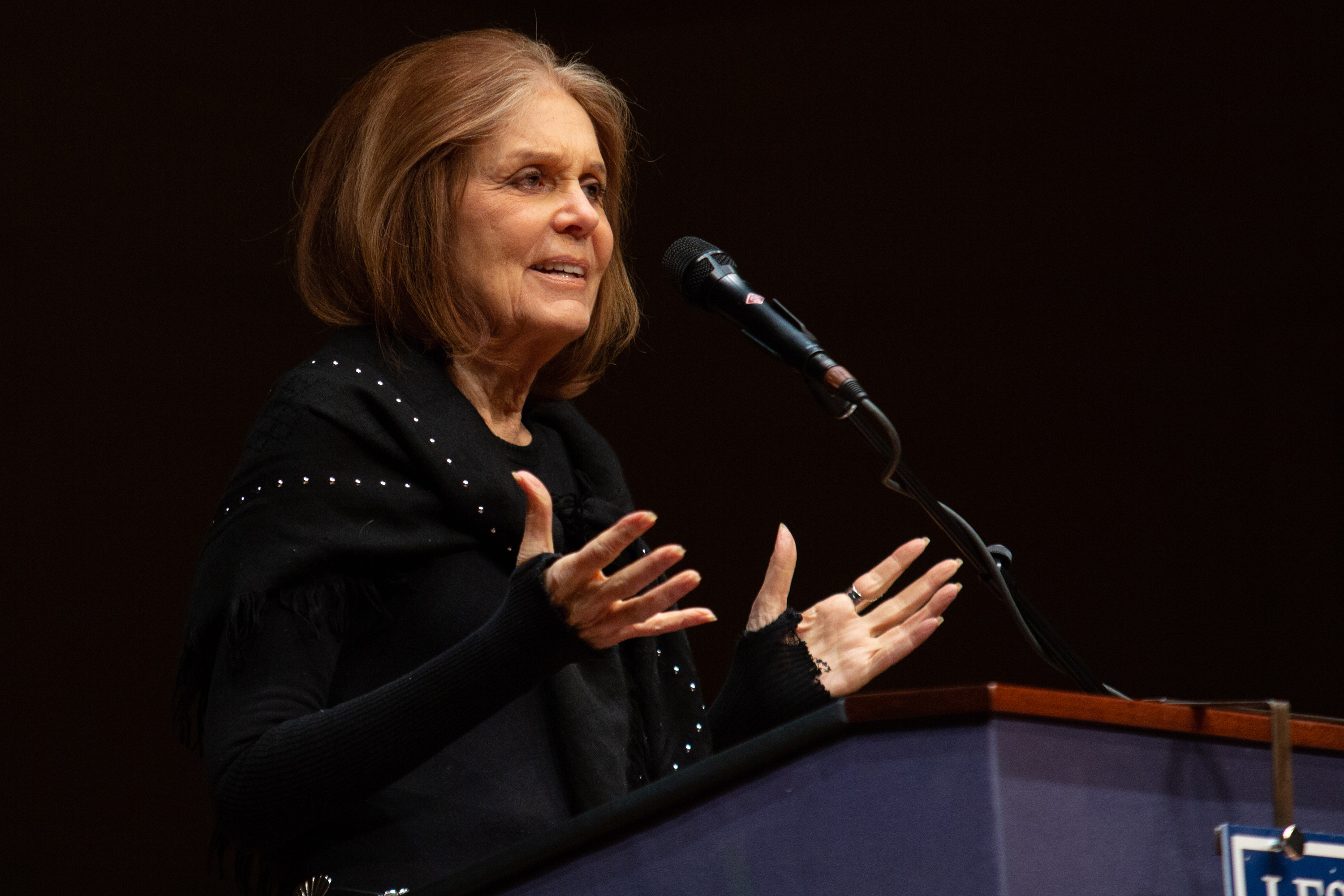 Gloria Steinem speaks at the Symphony Hall podium