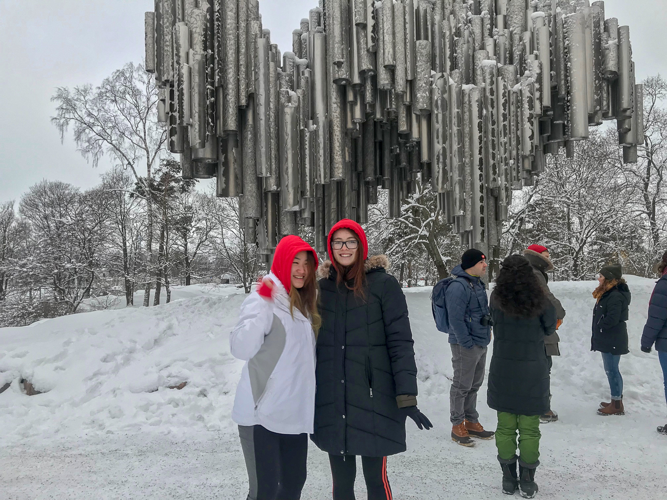 Two students in front of the Sibelius Monument in Helsinki