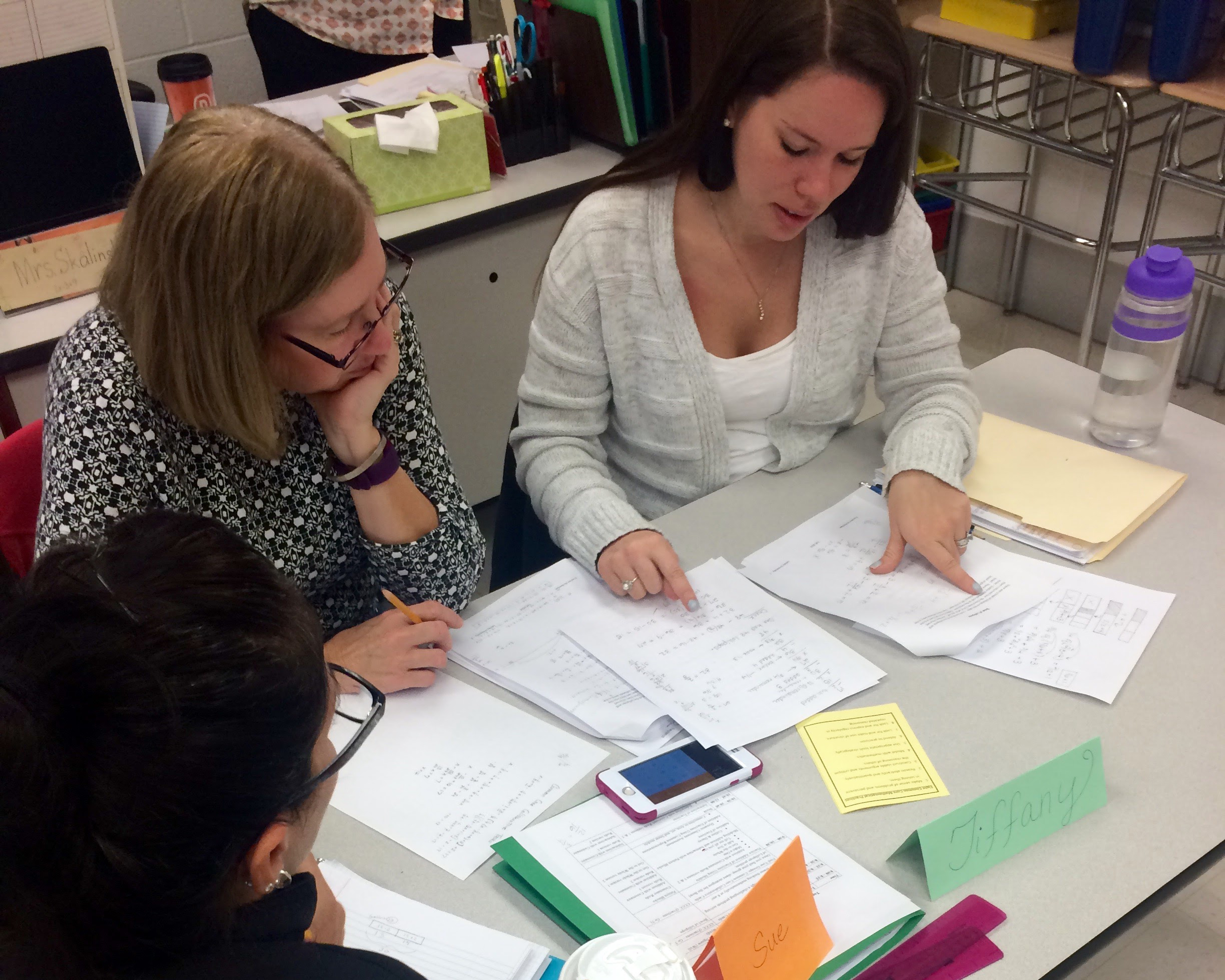 Center for Math Achievement district students working together on math problem