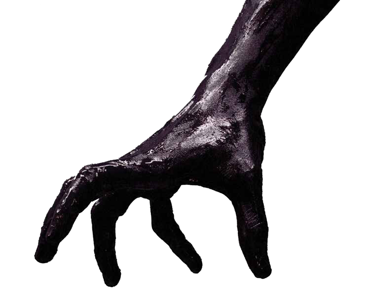 photo of arm reaching down covered in black ink