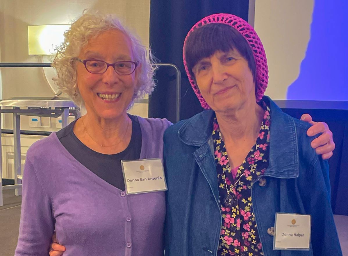 Friend and colleague Donna San Antonio, left, professor of Counseling & Psychology, congratulates Associate Professor Donna Halper on her induction into the Massachusetts Broadcasters Hall of Fame. Dr. San Antonio attended the June 8 induction ceremony on Massachusetts's South Shore