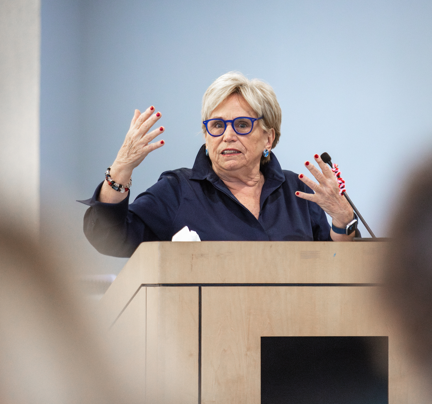 Margaret McKenna speaks at podium