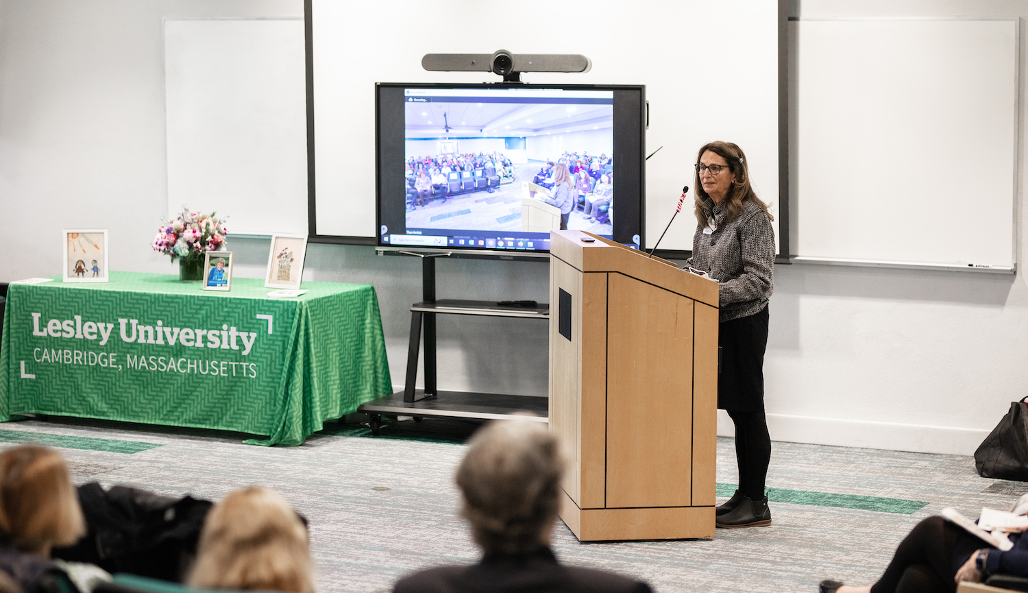 Karen Waldstein speaks at podium