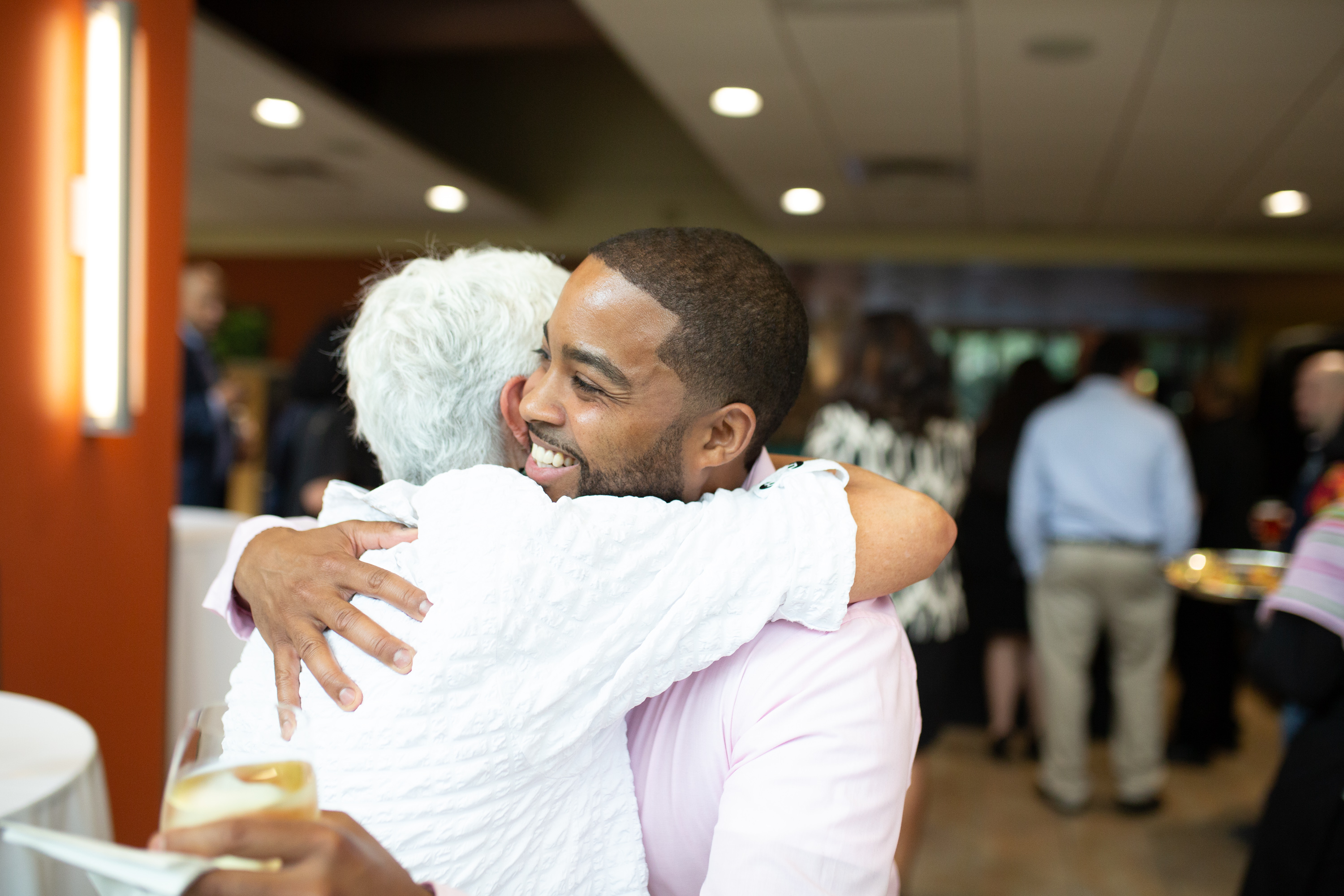 A man and woman hug