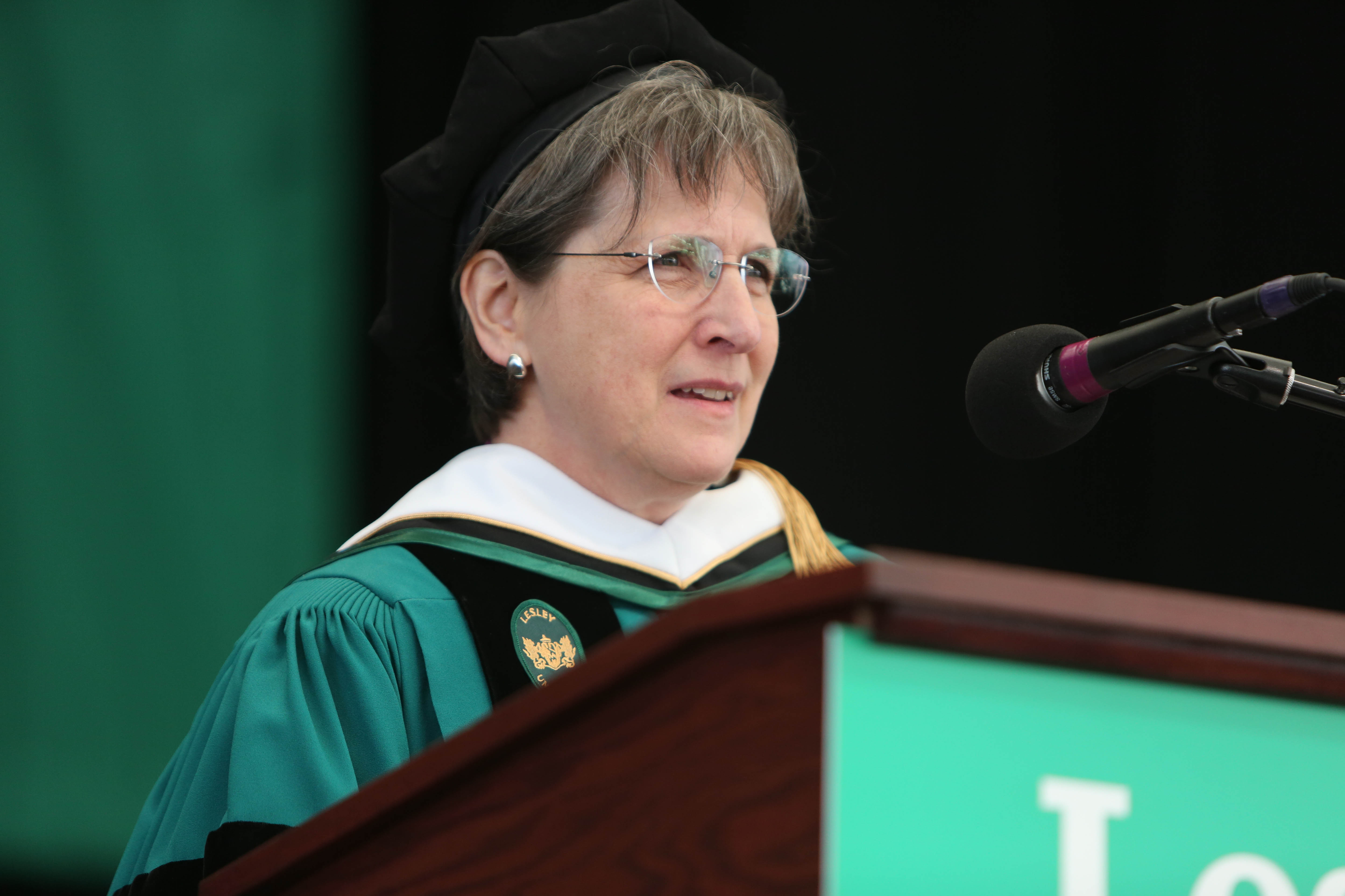 Alumna Alex Truesdell advised graduates, “No one works alone.”