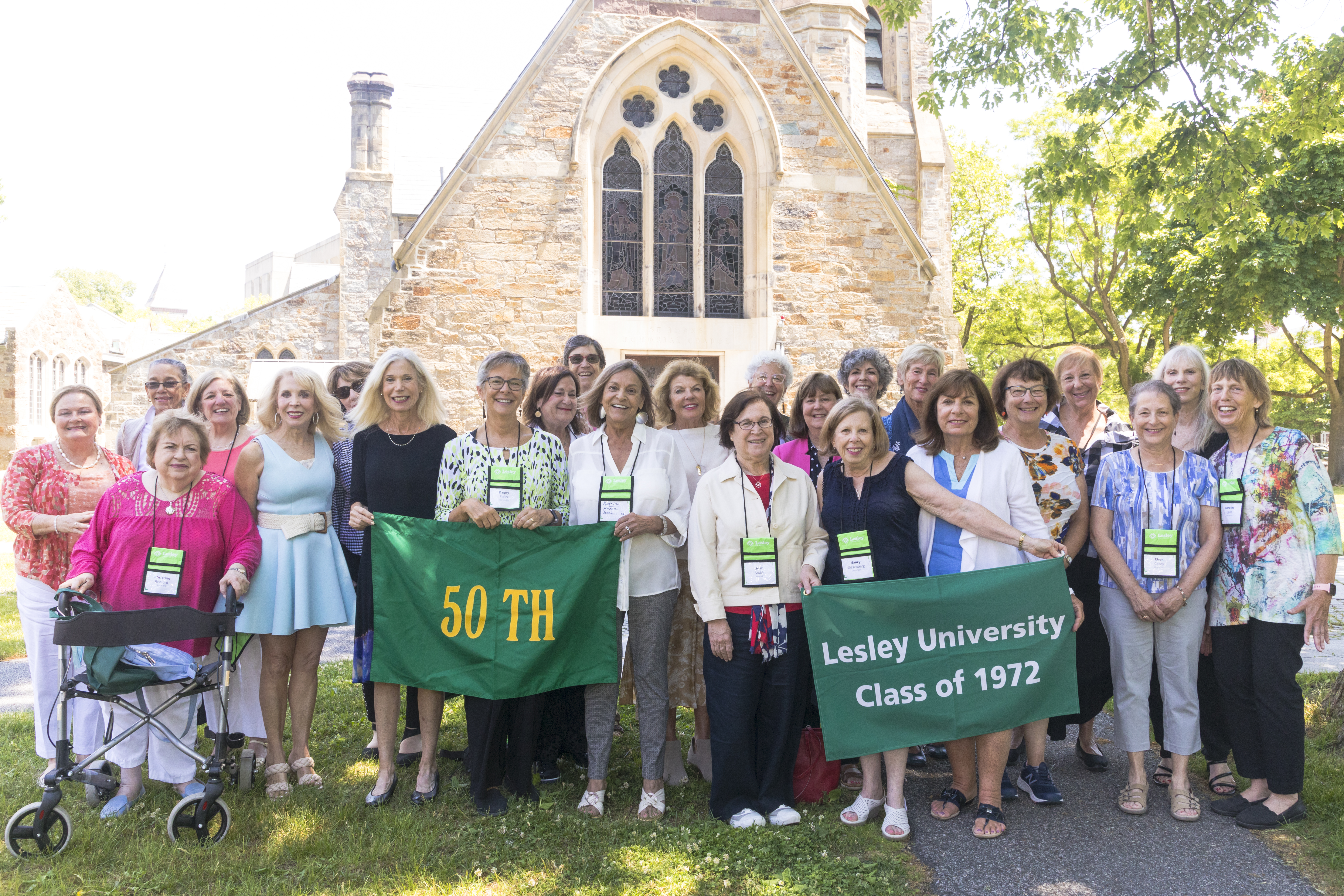 The Class of 1972 poses with their class banner