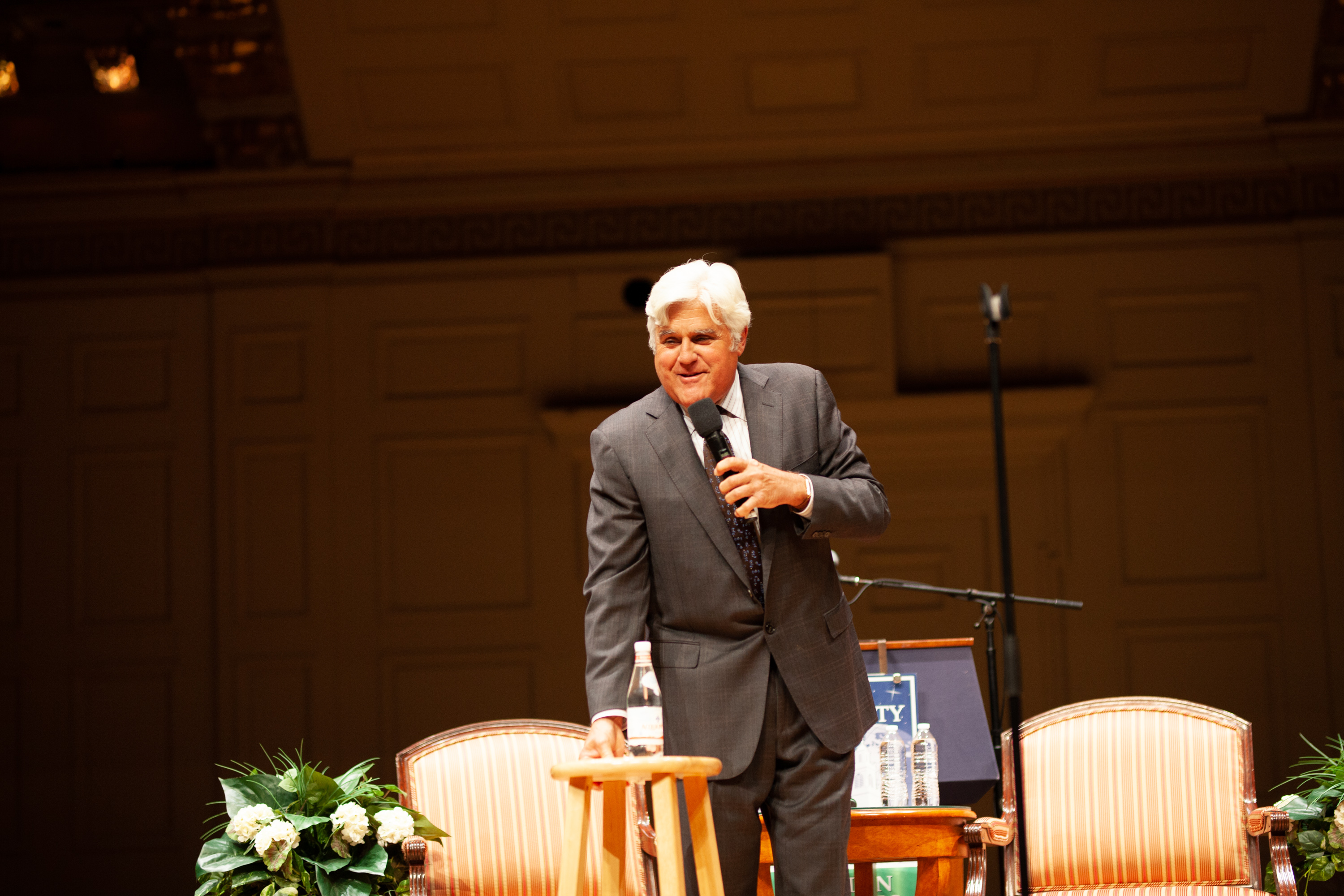 Jay Leno standing on Symphony Hall stage 