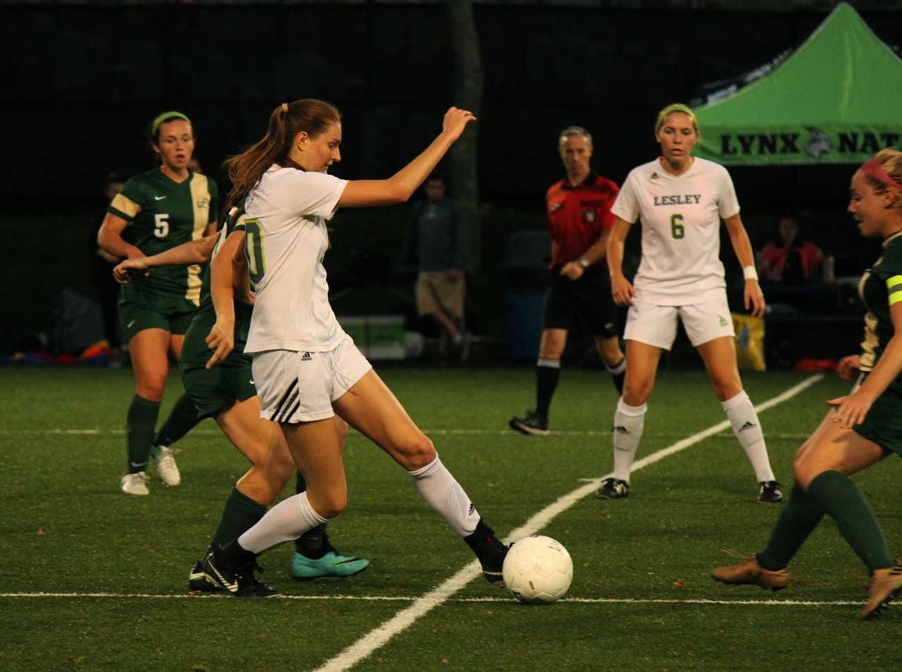 Lesley's womens soccer team playing in a match. 