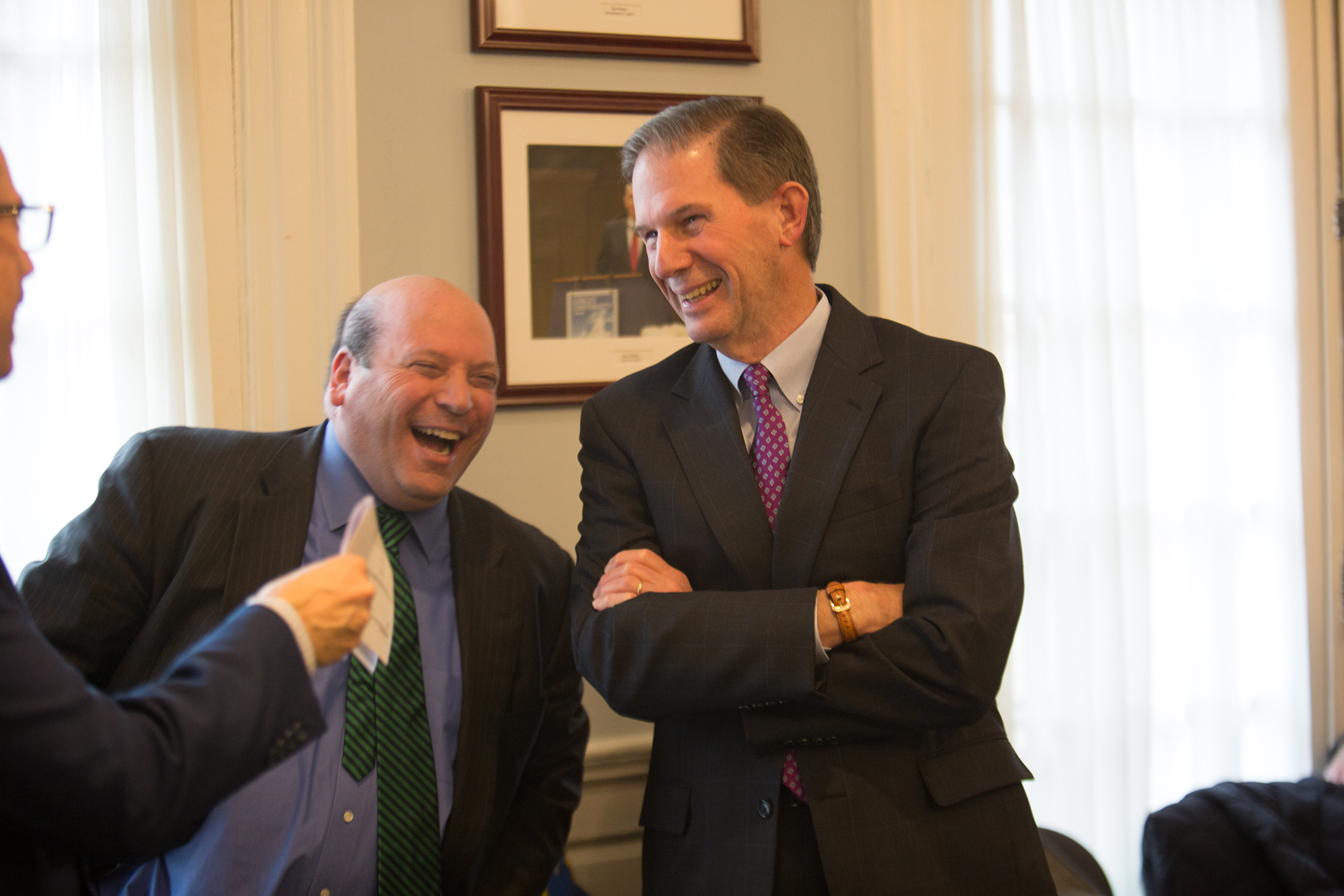 Jeff Weiss and Joe Moore share a laugh in Alumni Hall