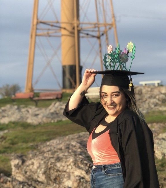 student marina bron wearing a graduation cap