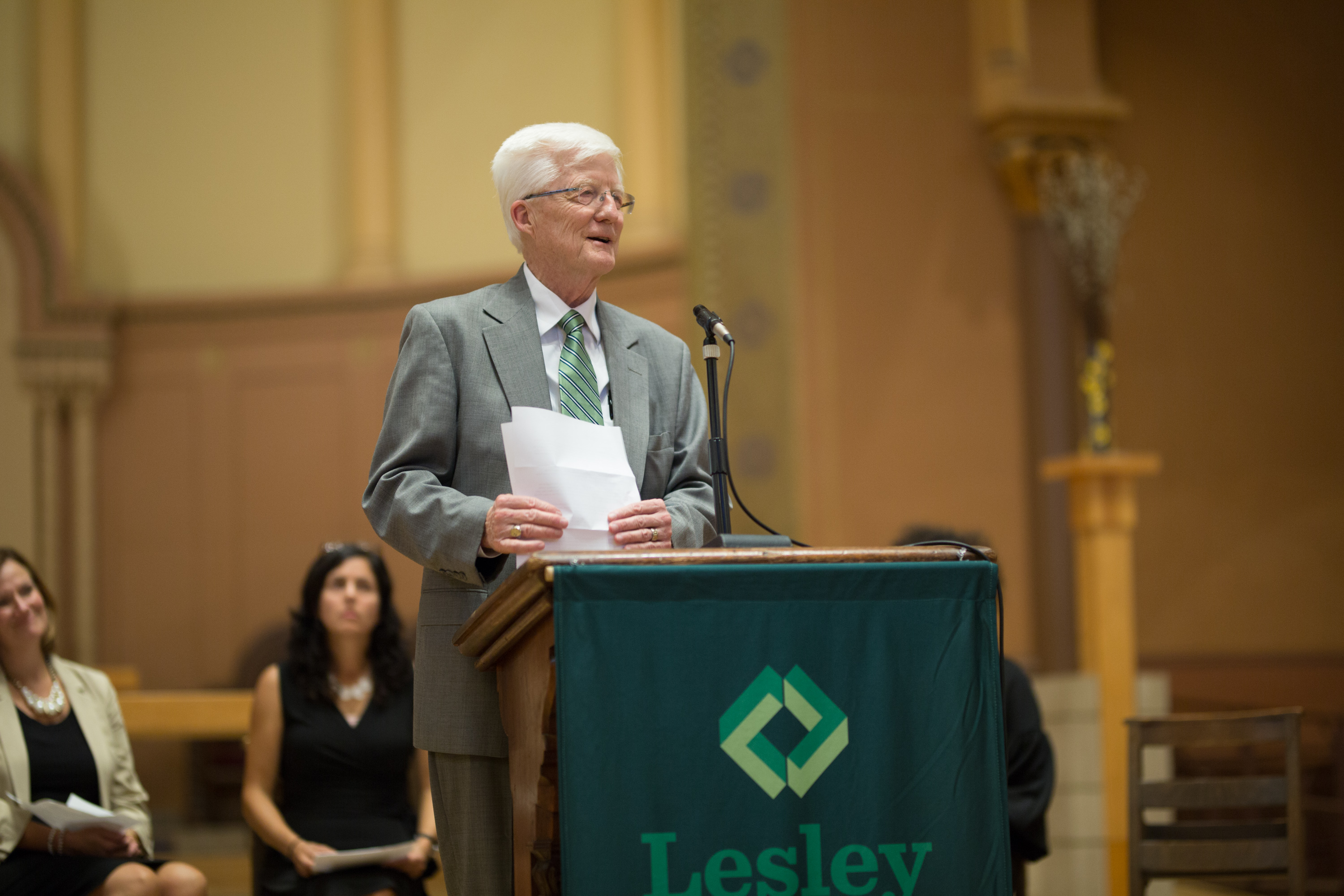 Interim Provost Richard Hansen speaks at the podium