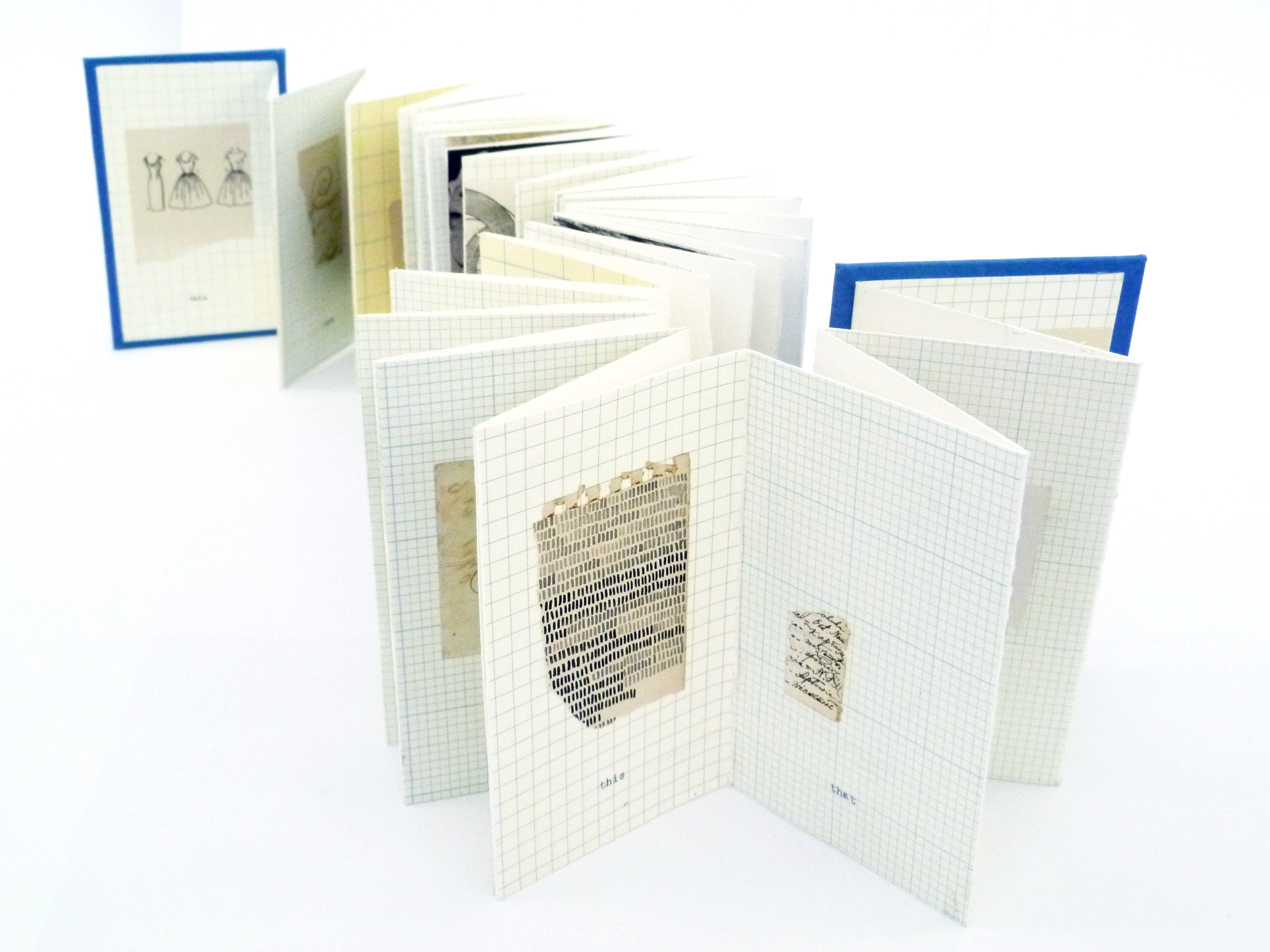 accordian fold artist book made with white graph paper