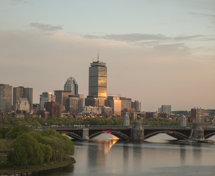 Photograph of downtown Boston and the Charles River at sunset