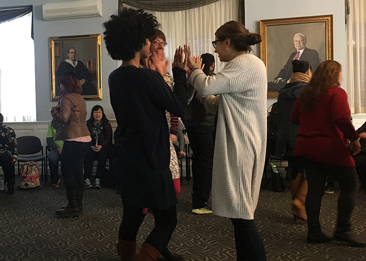 Students participate in an interactive ice breaker in Alumni Hall