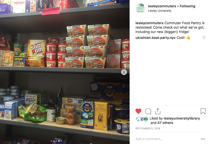 Photograph of the Lesley food pantry with stocked shelves of non-perishable food items.