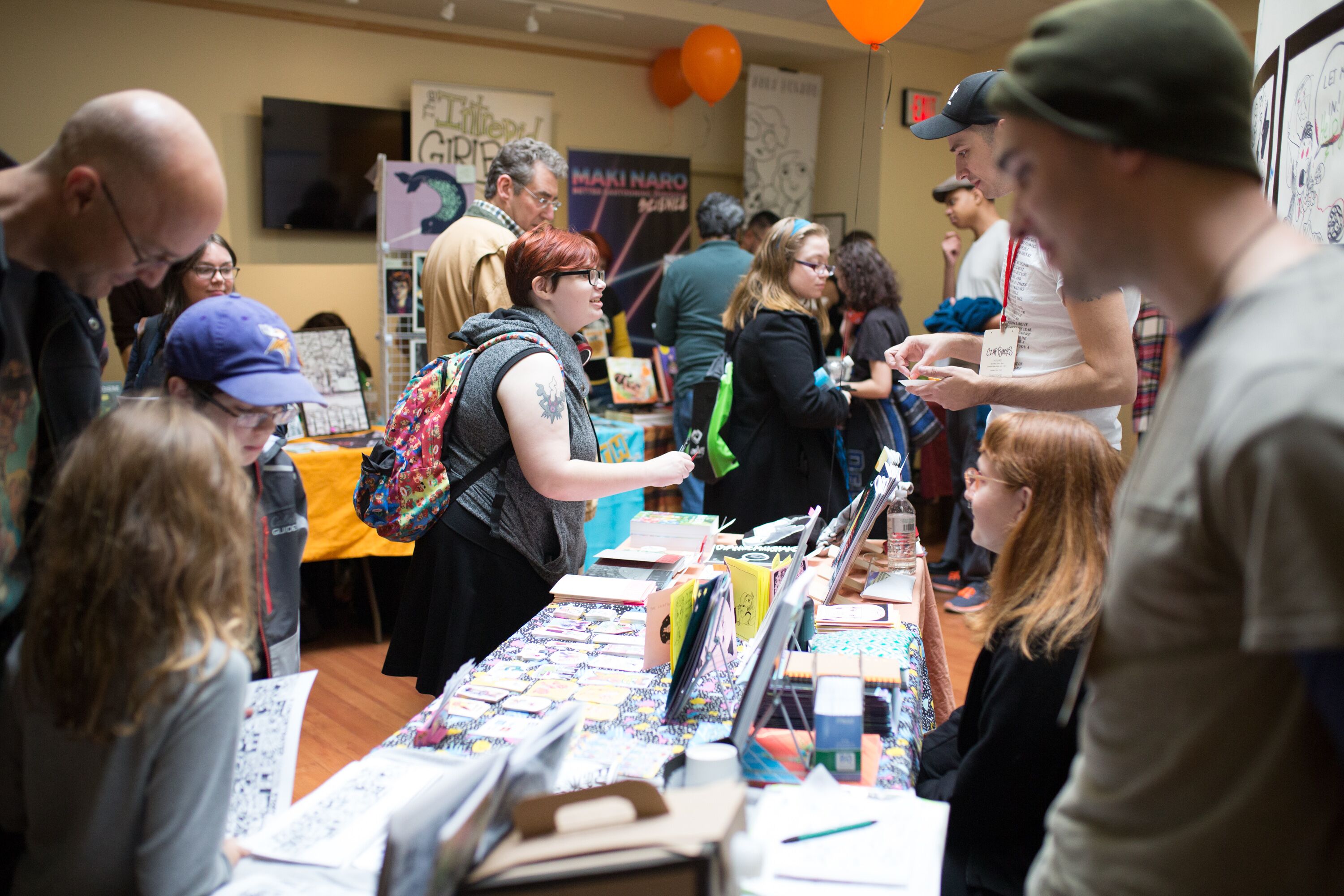 Massachusetts Independent Comics Expo tables, books, exhibitors, and visitors