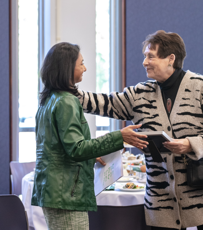 Gloria Noronha talking with Barbara Russell