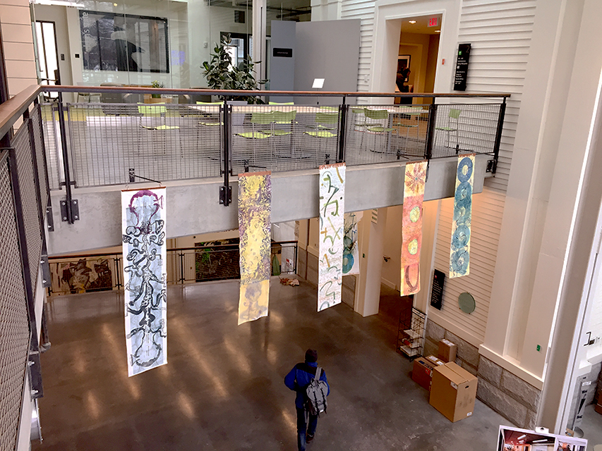 banner installation in the atrium of lunder