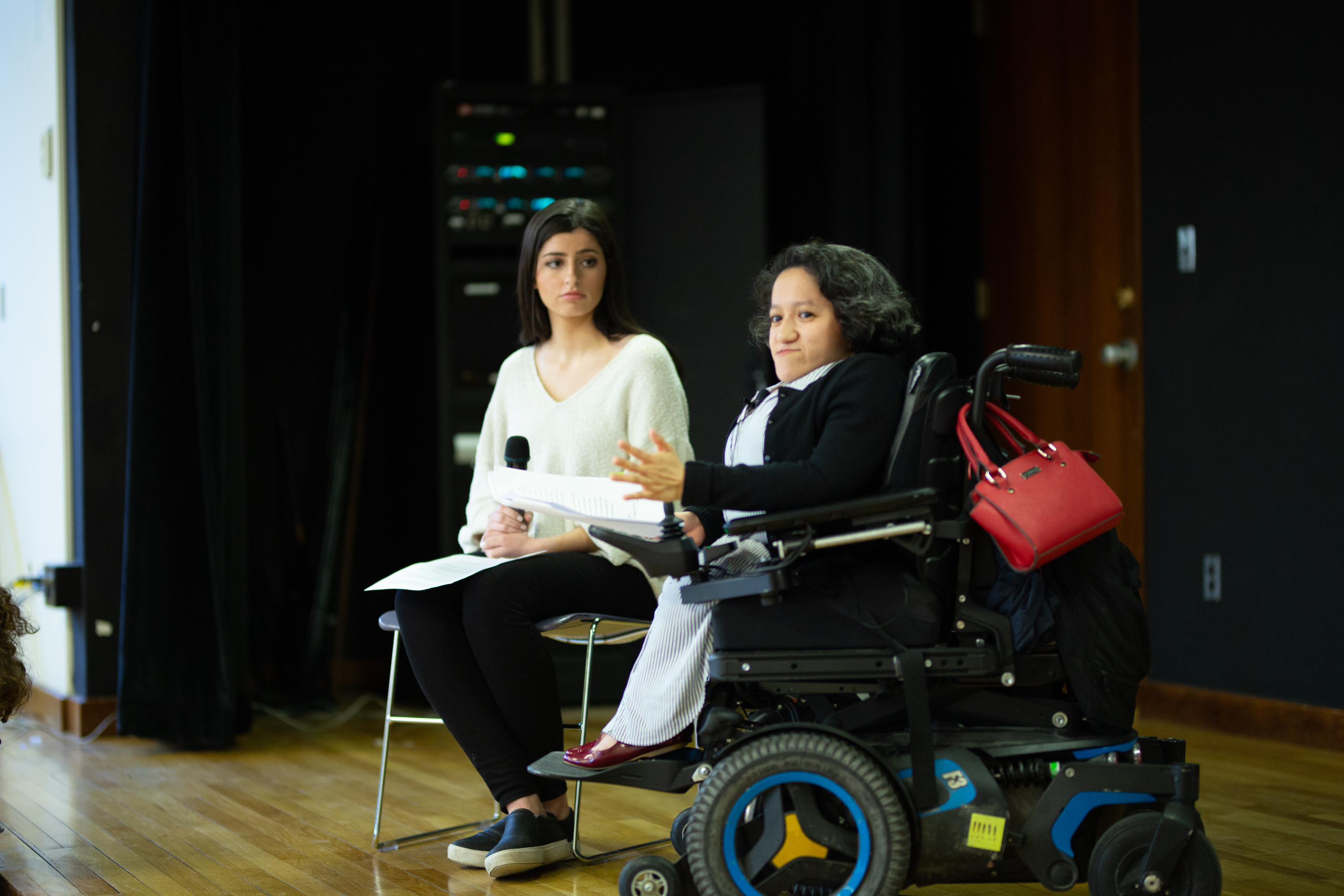 Chloe Fay (left) in conversation with Sandy Ho '09.