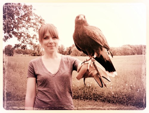 Student Holding Large Bird on her Hand