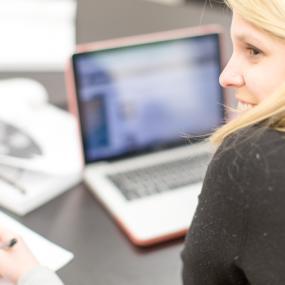 student using laptop computer 
