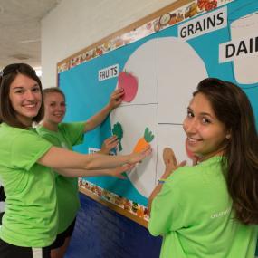 students helping with a service project