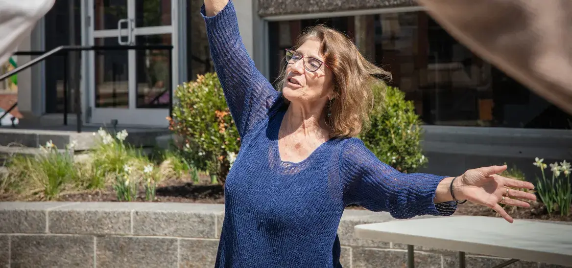 Woman with arms up