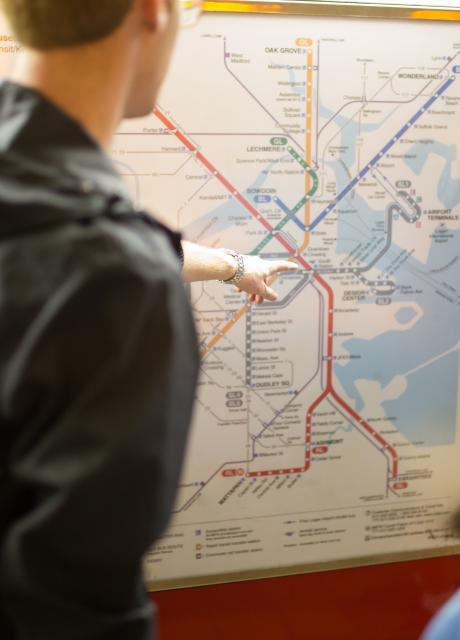 student navigating a subway transportation map
