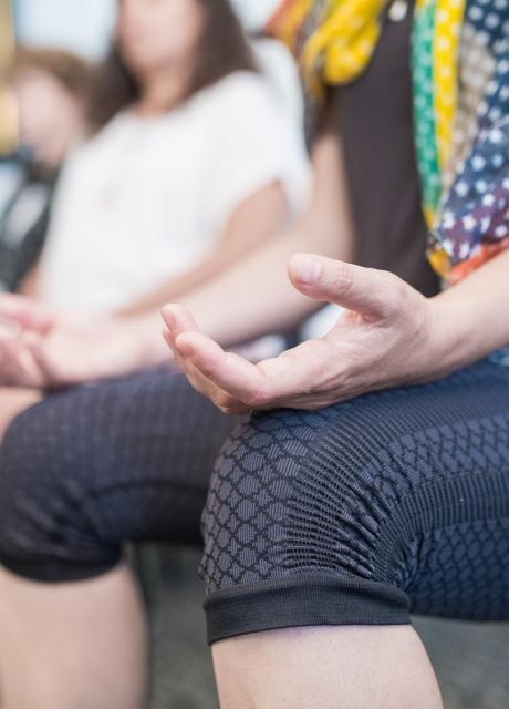 Students engaged in mindfulness poses