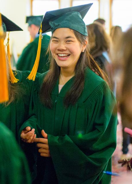 Smiling Threshold student at graduation