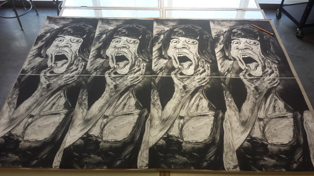drawing laid out on large table in print studio
