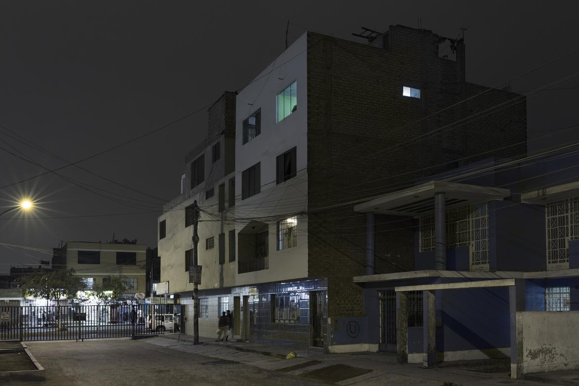 photograph of city neighborhood at night
