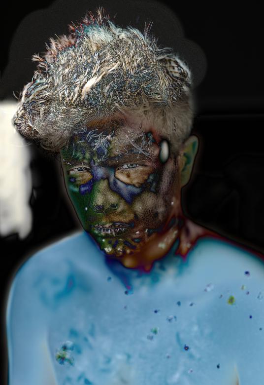 photo of person with blue and green discolored face