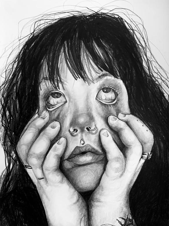 Black and white charcoal portrait of a girl