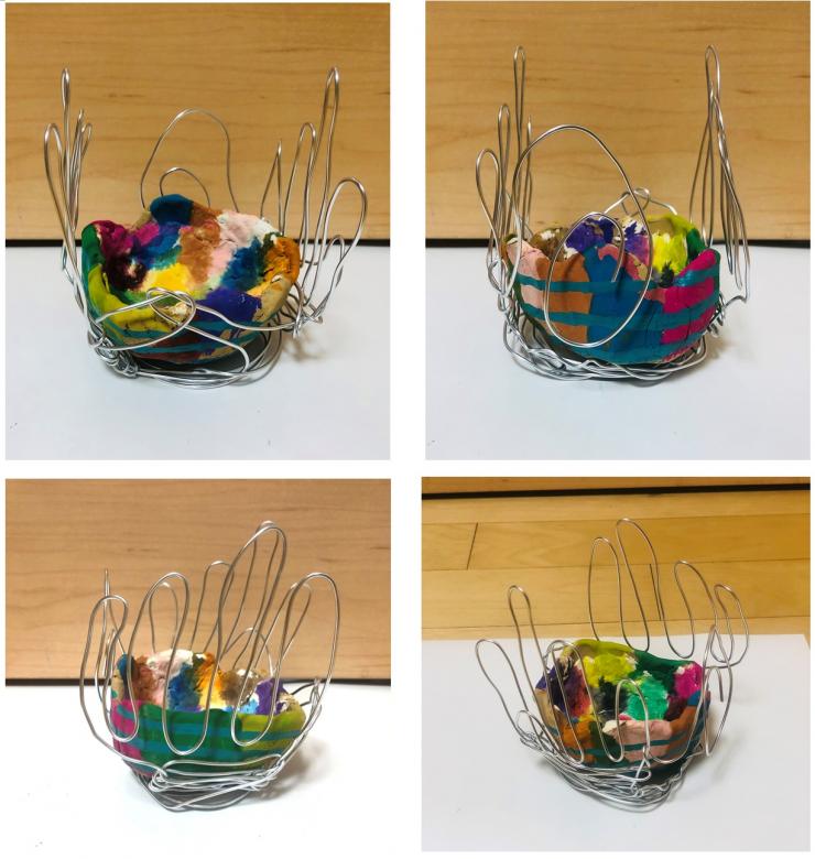 Four distinct views of a multicolored clay bowl which is wrapped in silver wire coming up into the shape of hands holding the bowl.