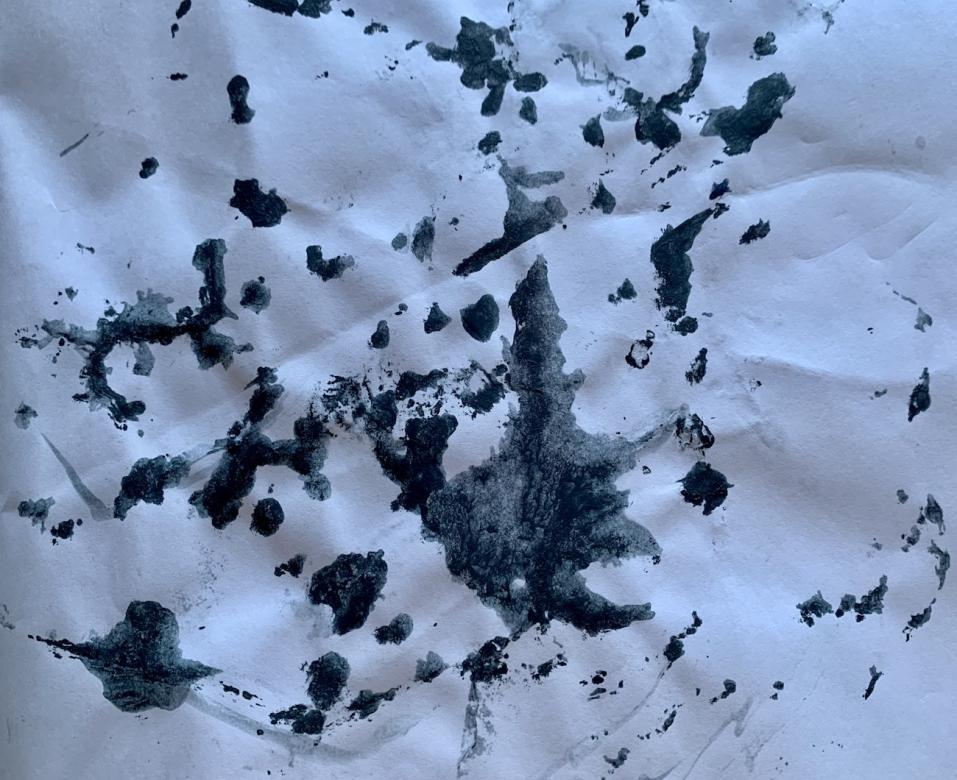 photo of black ink on paper