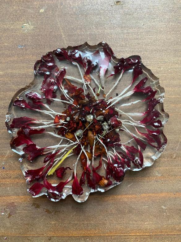 coaster with red flowers inside