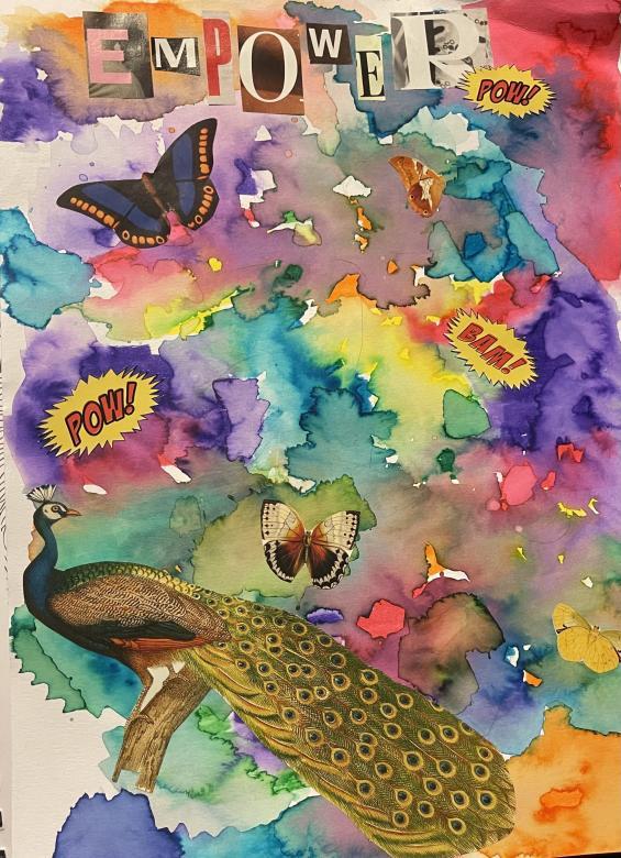 MIxed Media. At the top of the piece, written in magazine cutout letters is the word “empower”. In the bottom left corner is a cutout of a peacock sitting on a branch. Throughout the piece are four cutouts of butterflies. Also throughout the piece are three cutouts, two which say “POW!” and one which says “BAM!” the letters are red with a yellow background. The backdrop of this piece is rainbow watercolor with several different splotches that blend with each other.