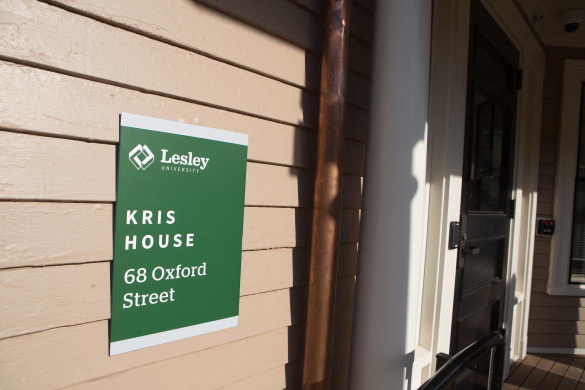 Up close shot of the "kris house" sign