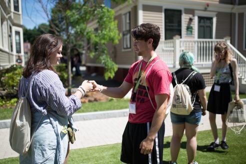 male and female student participating in orientation activities