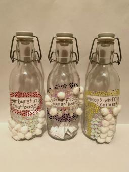 Group View of Three G=Mixed Media Glass Bottles previously depicted in the gallery titled "Loud Chatterboxes", "Wacky Children", and "Wonderful Human Beings"