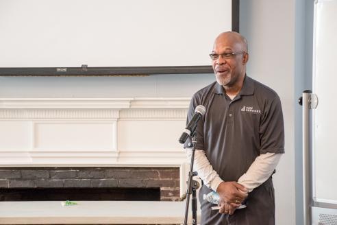 Leon Greene, Ava's husband, speaks in Alumni Hall.