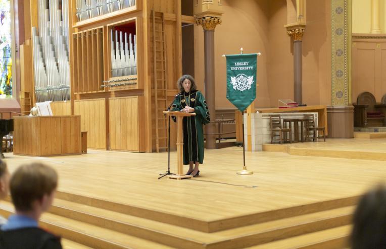 President Steinmayer standing at a podium