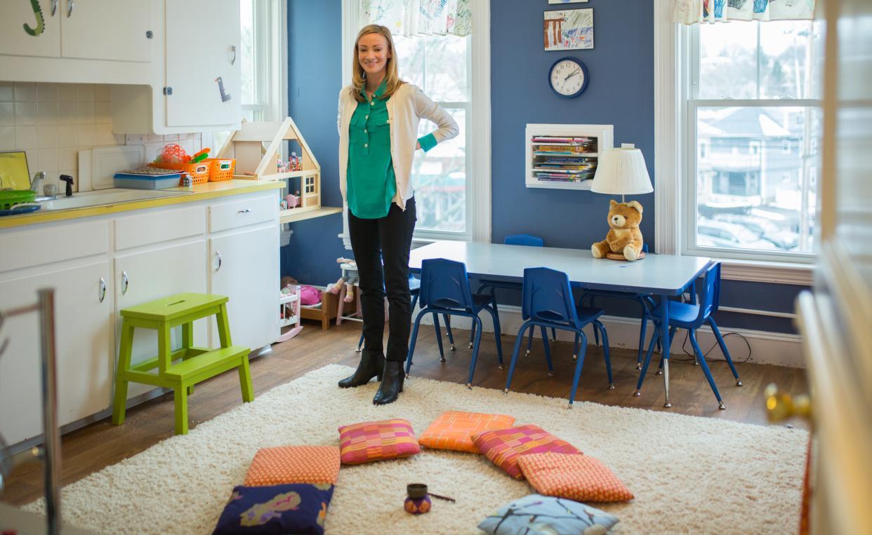 Colleen Shannon stands in a room at the Children's Place.