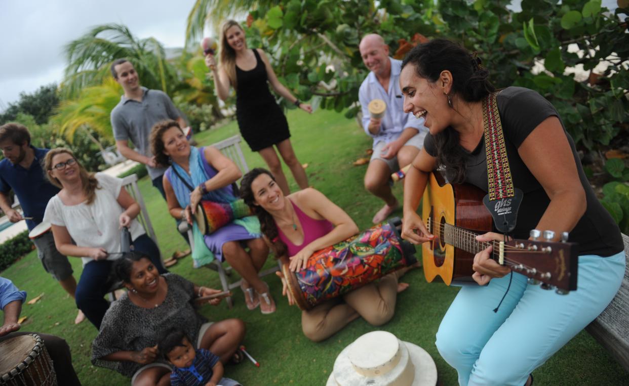 Julianne Parolsi playing guitar