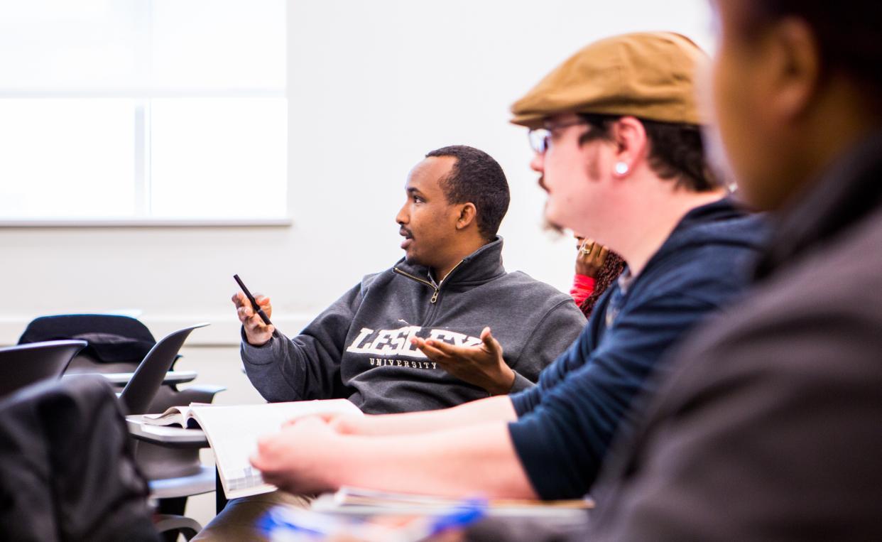 3 students sitting in classroom at Bunker Hill Community College