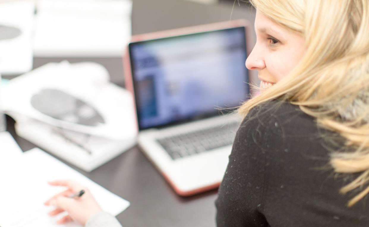 student using laptop computer 