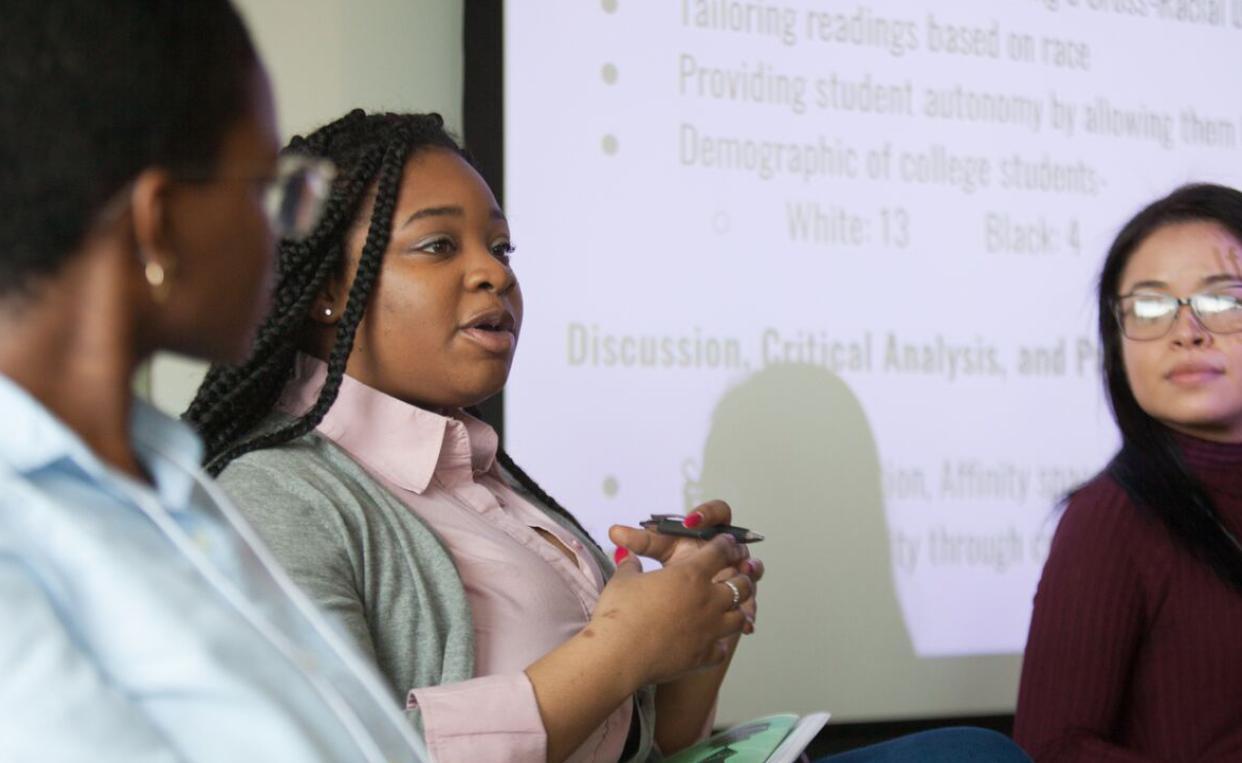 A panel of three women in discussion at Community of Scholars Day