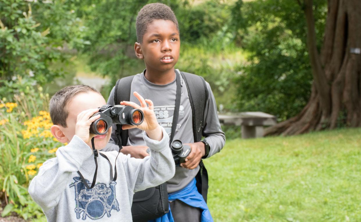 Children exploring at Mt. Auburn cemetary.