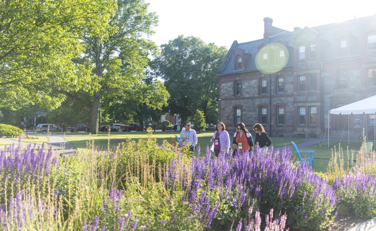 Alumni cross South Campus during 2022 Alumni Reunion